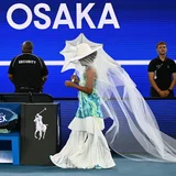 Naomi Osaka tones down her walk-on outfit for second-round match at the Australian Open