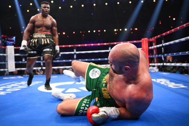 Fury survives knockdown to claim controversial victory against Ngannou