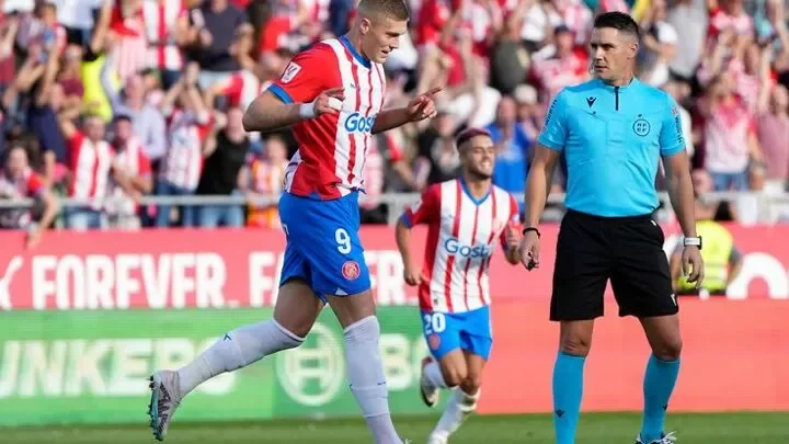 Girona rallies from two goals down to defeat Almeria 5-2 and join Real Madrid at the top of LaLiga.