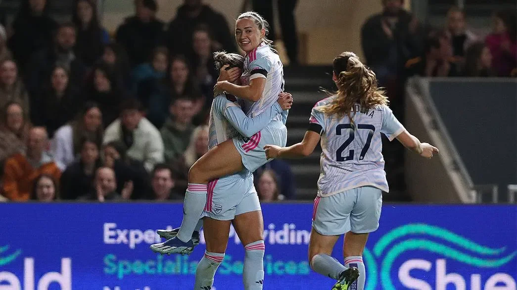 WSL: Katie McCabe double secures Arsenal's victory in front of a record Robins crowd.