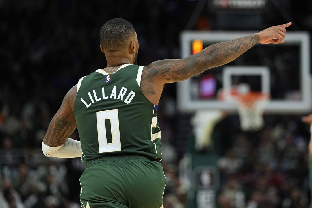 Damian Lillard debuts with 39 points, leads Milwaukee Bucks to victory over Philadelphia 76ers.