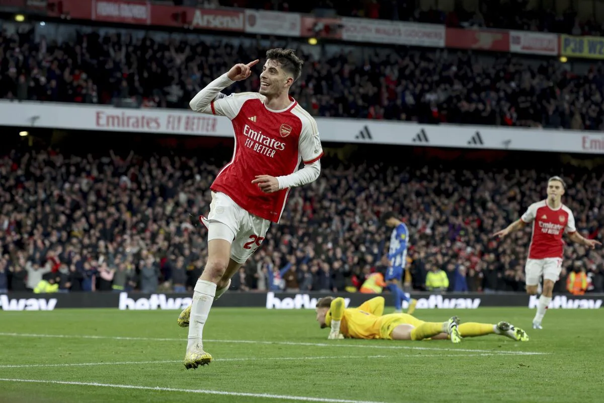 Arsenal 2-0 Brighton: Gunners cruise to victory to go top of the table