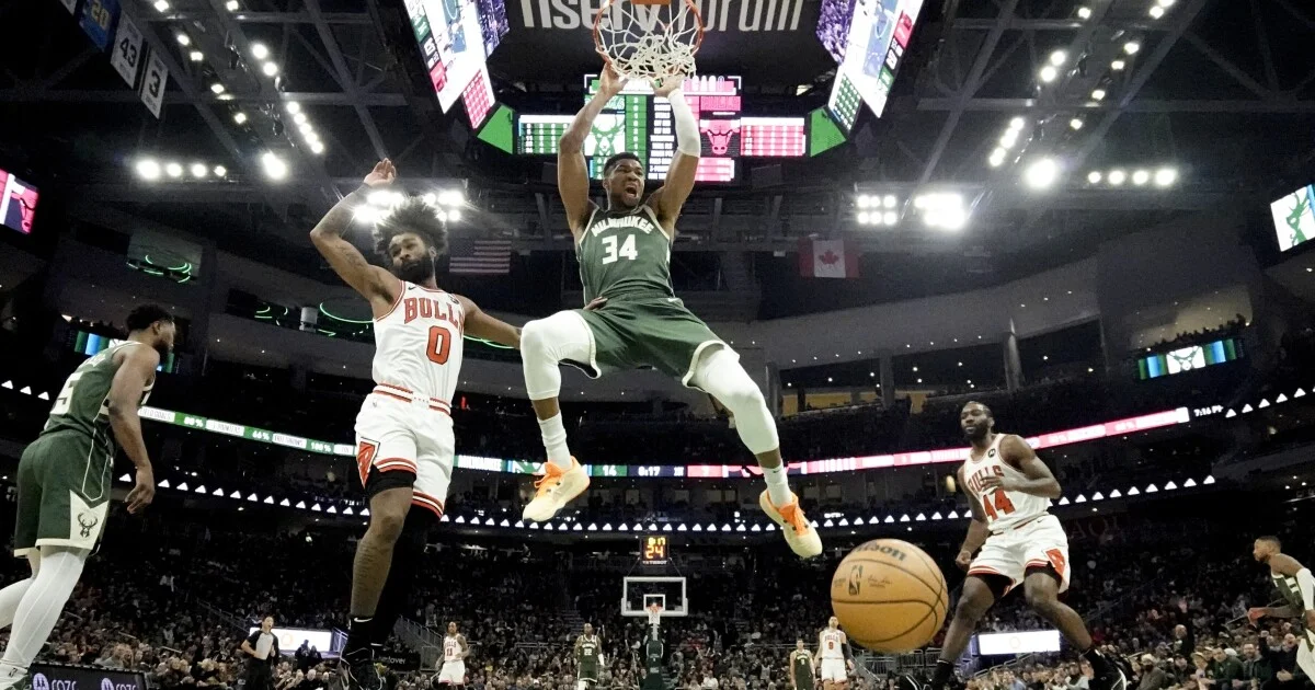 Giannis, Bucks hold off Bulls in OT thriller