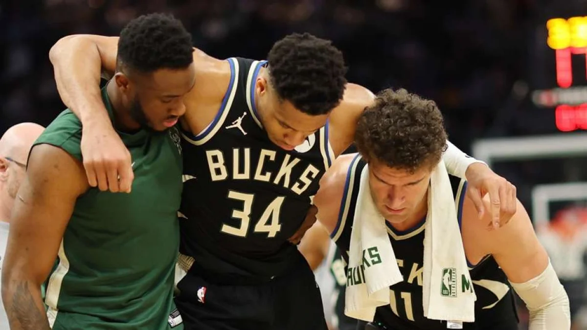 NBA roundup: Antetokounmpo suffers injury, Warriors down Lakers