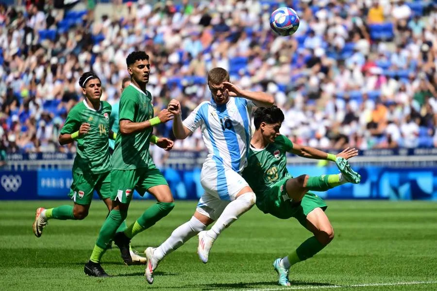 Argentina keep Olympic football hopes alive with victory over Iraq