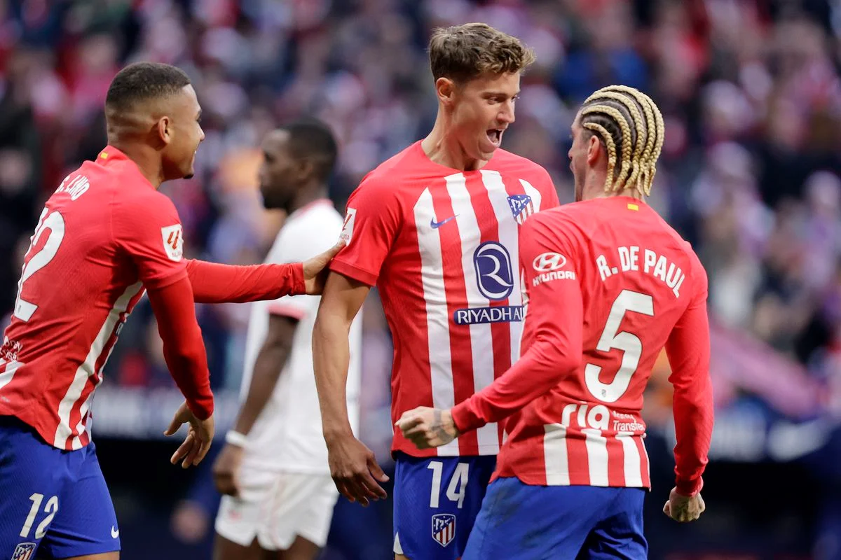 Atletico Madrid 1-0 Sevilla: Ten-man Atletico hold on for vital win over struggling visitors