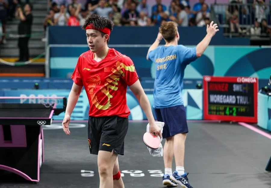 China's world number one loses at Olympics after table tennis bat broken