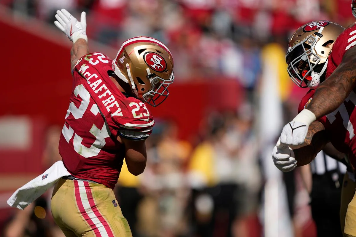 Christian McCaffrey scores four touchdowns as the 49ers defeat the Cardinals.