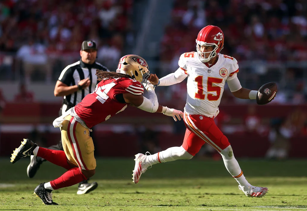 NFL Roundup: Unbeaten Chiefs Roll Over 49ers, Lions End Vikings' Perfect Run