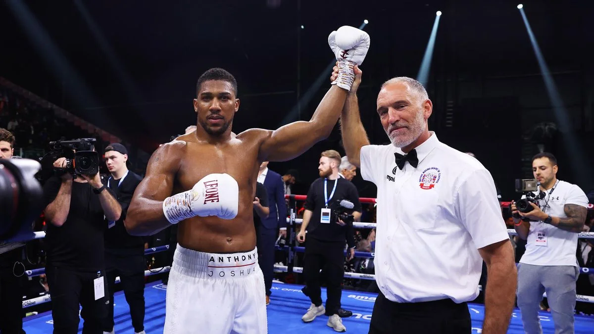 Joshua downs Wallin after five rounds in heavyweight clash, Parker overpowers Wilder