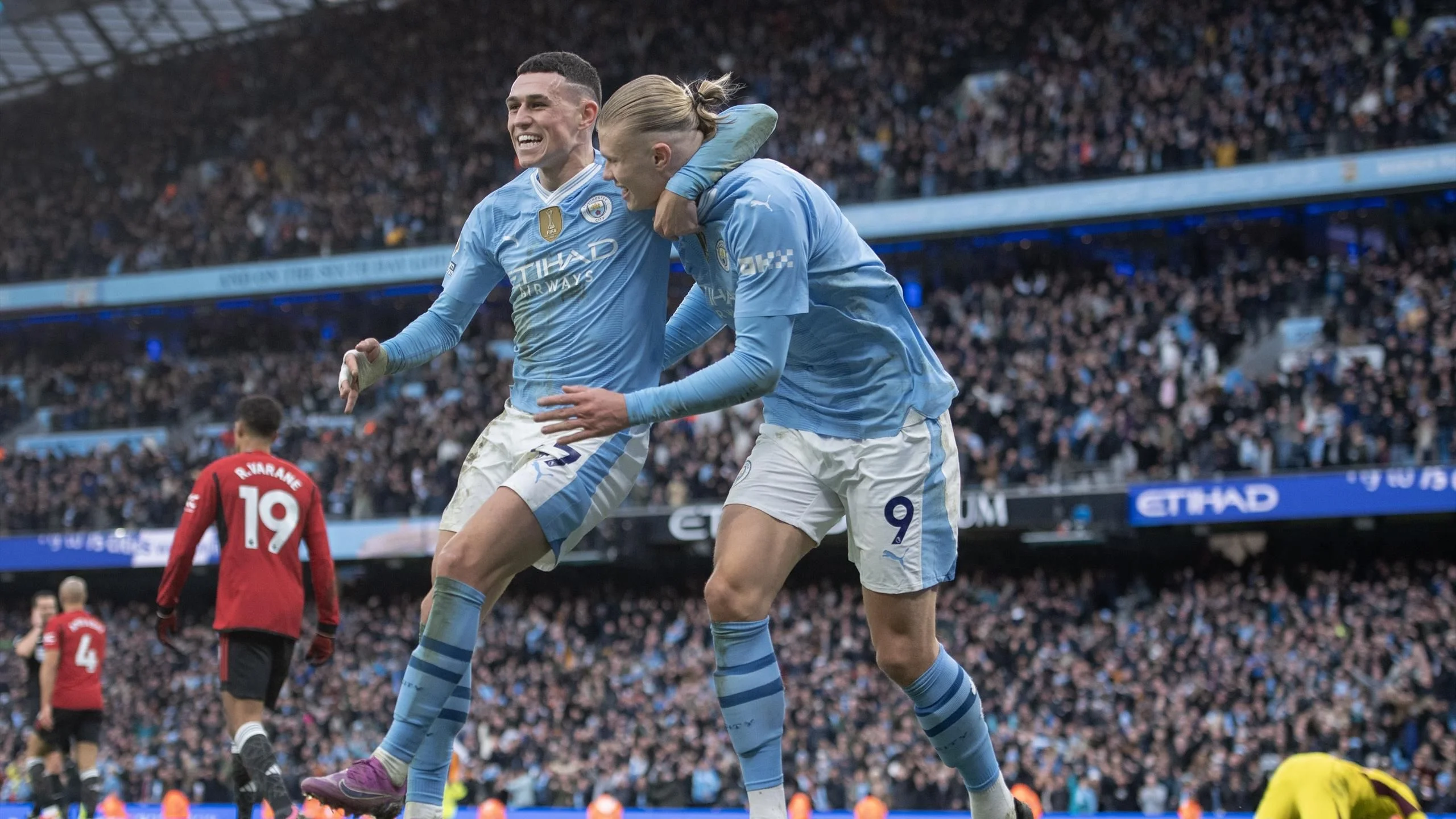 Manchester City 3-1 Manchester United: Phil Foden scores twice as City come from behind to win Manchester derby and keep pace with league leaders