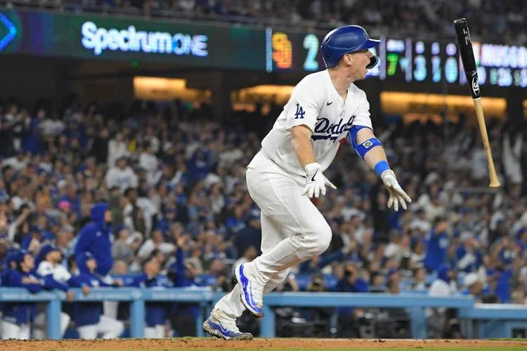 Dodgers rally with 5 runs in 7th and beat Padres 7-2 to clinch 11th NL West title in 12 years