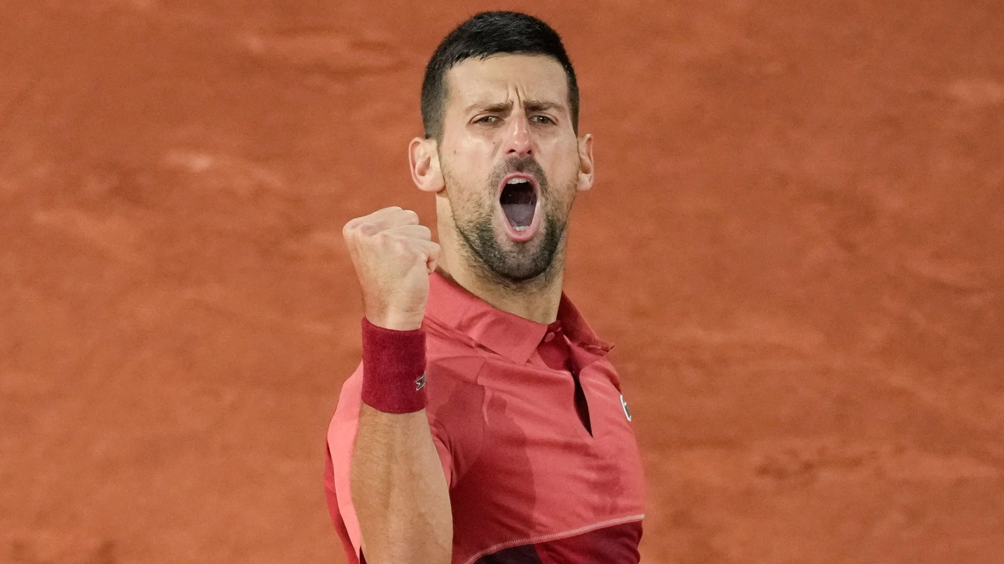 Djokovic and Sabalenka cruise through on rainy day at French Open