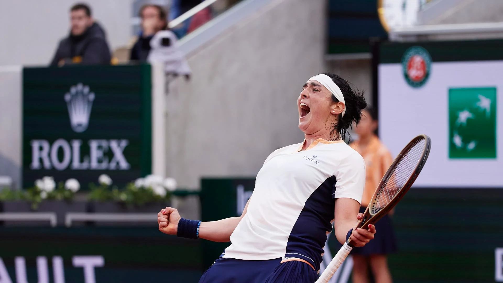 Jabeur ends Tauson's run to reach French Open quarters