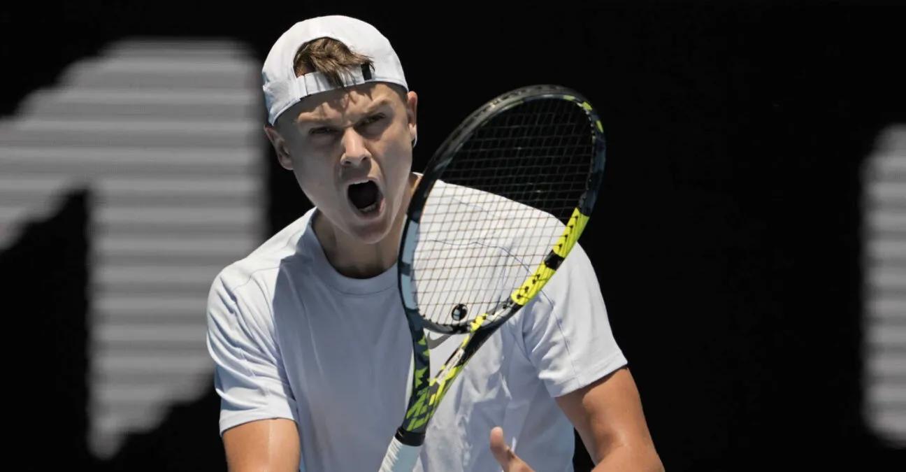 Holger Rune battles past Zhizhen Zhang in epic five-set thriller at Australian Open