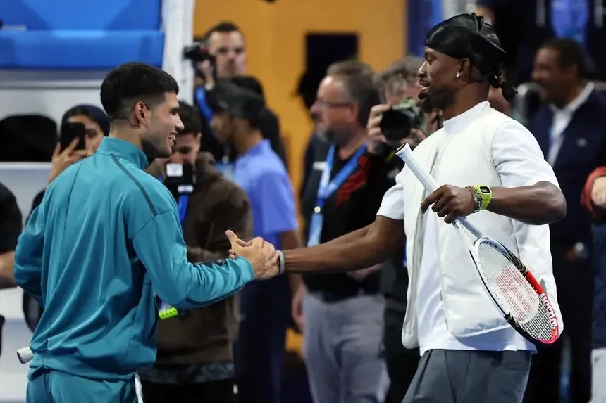Carlos Alcaraz hits the court with NBA star Jimmy Butler after his victory in Doha