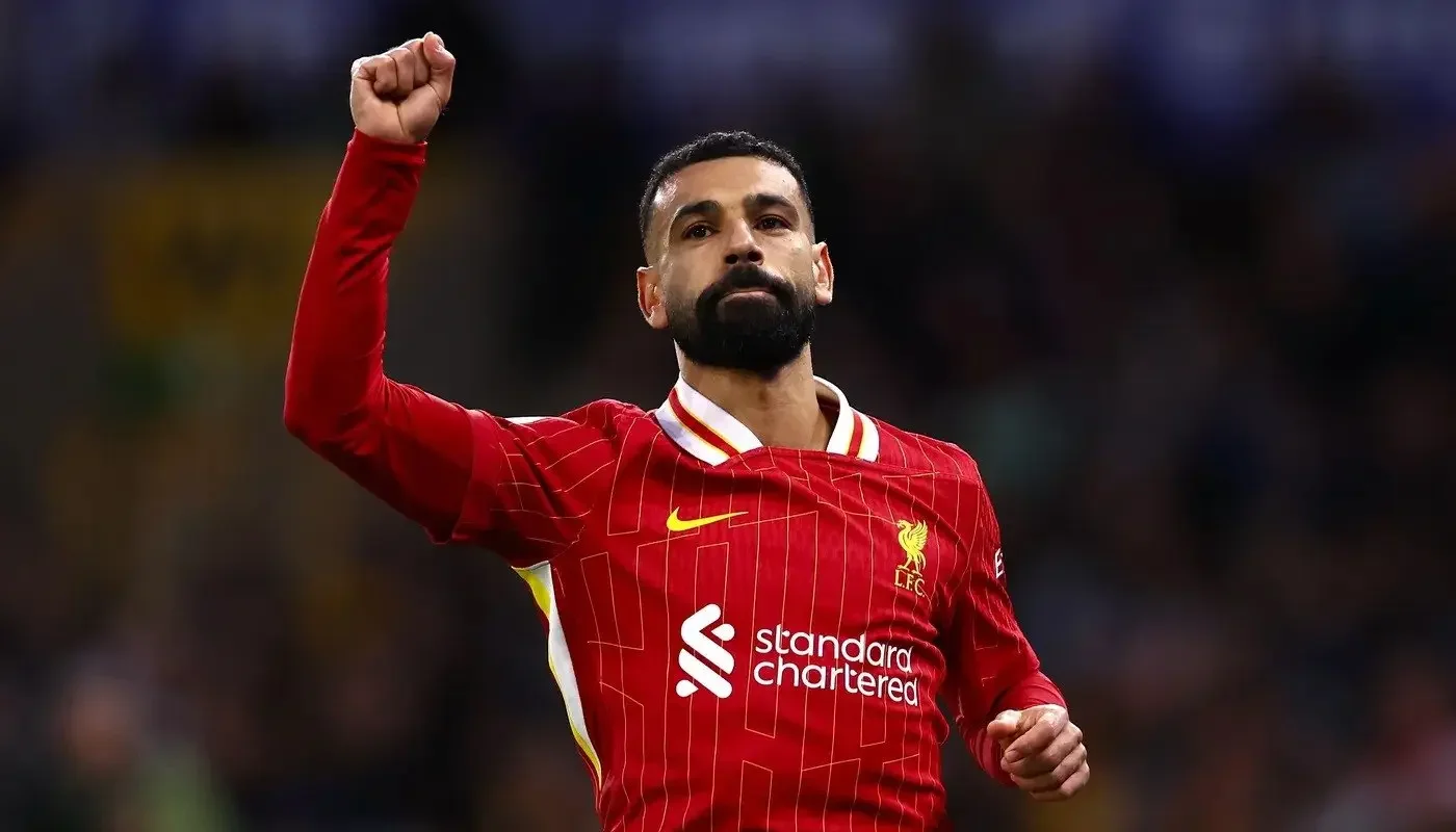Liverpool 2-1 Wolves:  Salah on target as Reds survive Wolves scare