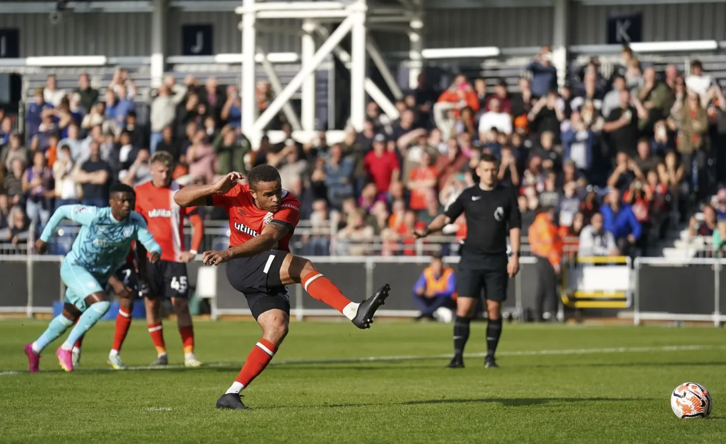 Luton Earns First Premier League Point in 1-1 Draw Against 10-Man Wolves