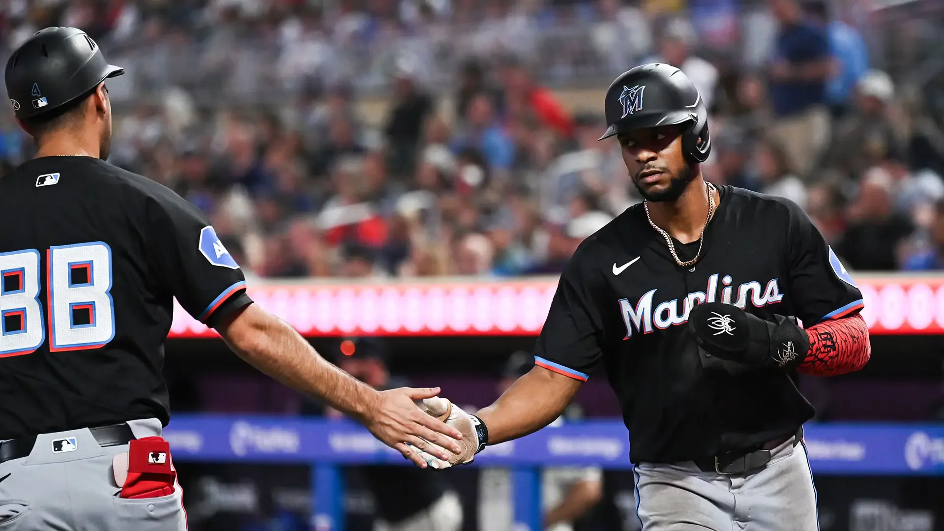 Marlins push Twins to brink of elimination with 8-6 win in 13 innings
