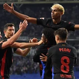 Barcelona win La Liga title to seal domestic treble in style