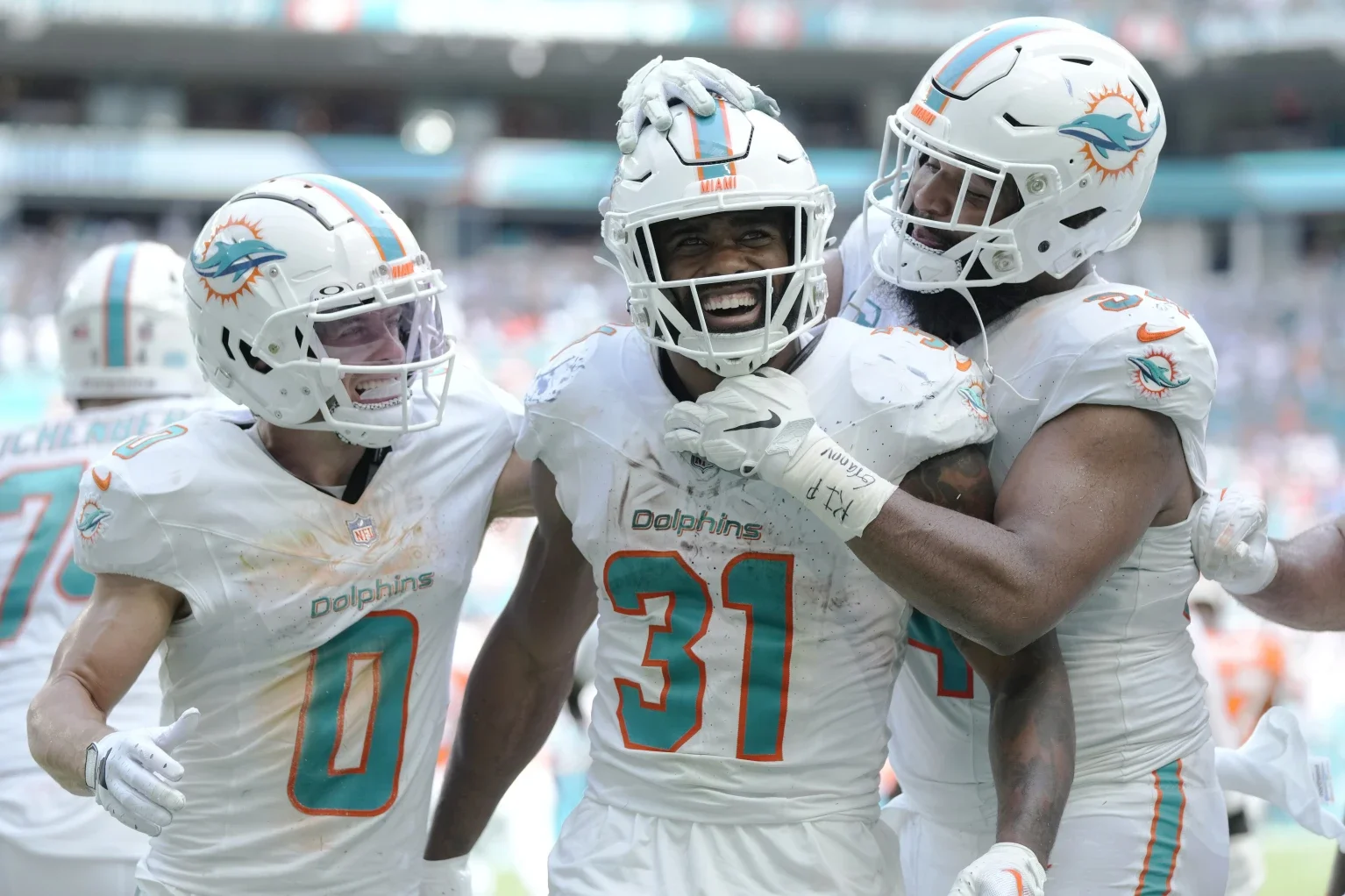 Miami Dolphins' Record-Setting Triumph: A 70-20 Rout, But Some Milestones Missed