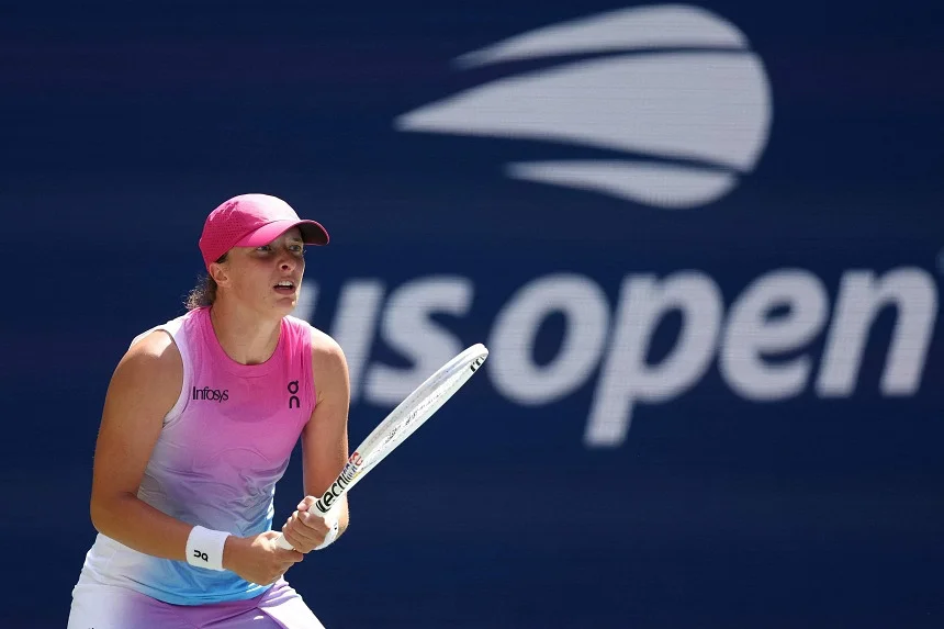 Swiatek survives error-filled start to reach US Open second round in straight sets