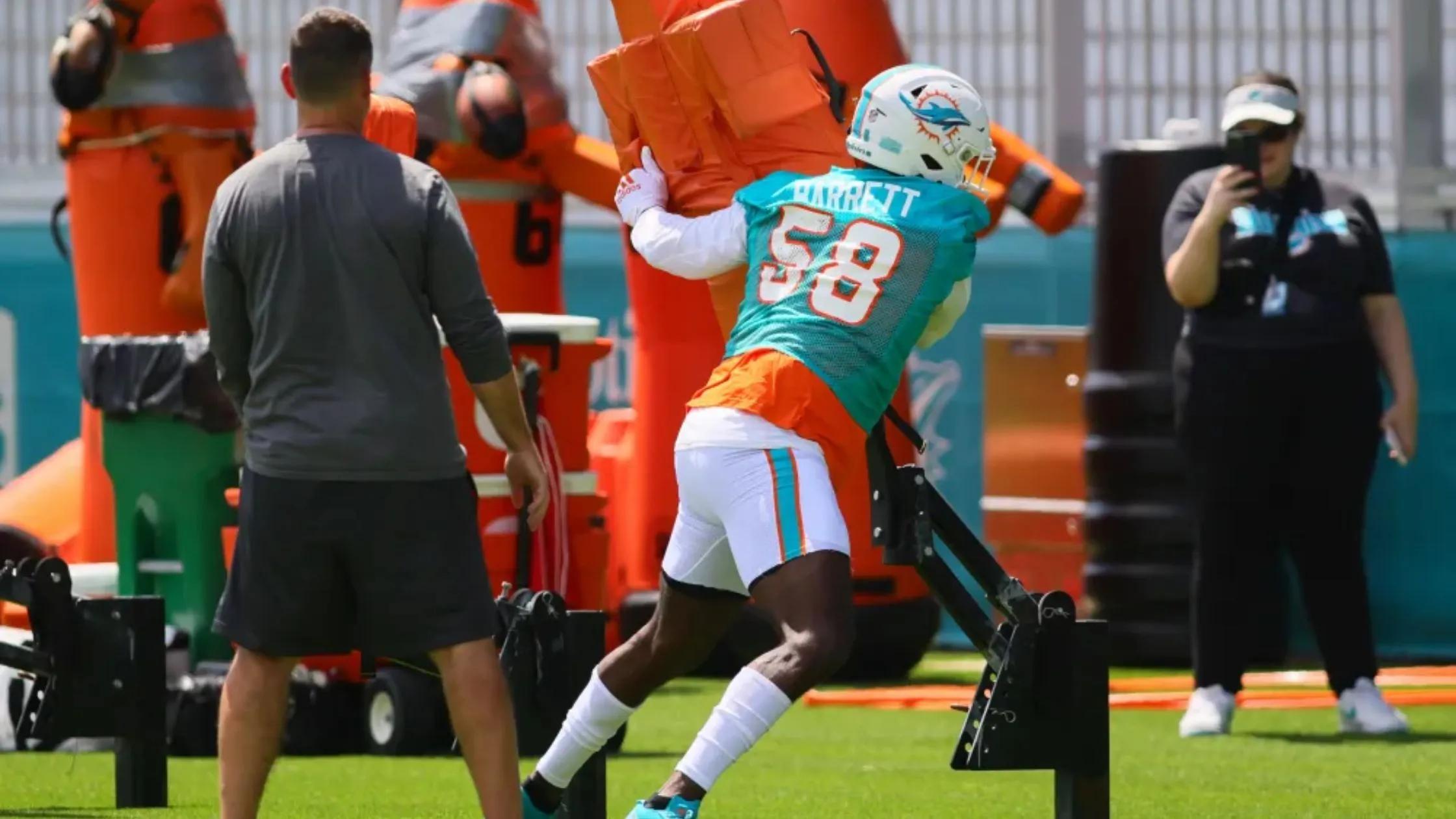 Miami Dolphins waiving linebacker Shaq Barrett, eligible to play if he clears waivers