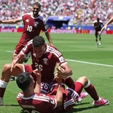 Khoukhi's late header gives Qatar first-ever World Cup point