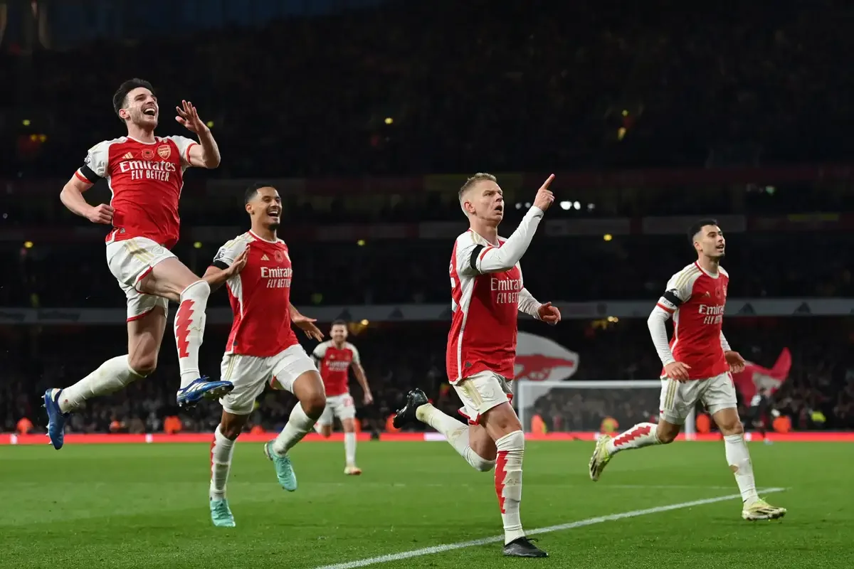 10-man Arsenal breeze past Burnley