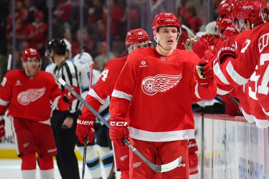 NHL Roundup: Red Wings Dominate Sabres with Seven-Goal Blitz, Canucks Edge Flames in Shootout
