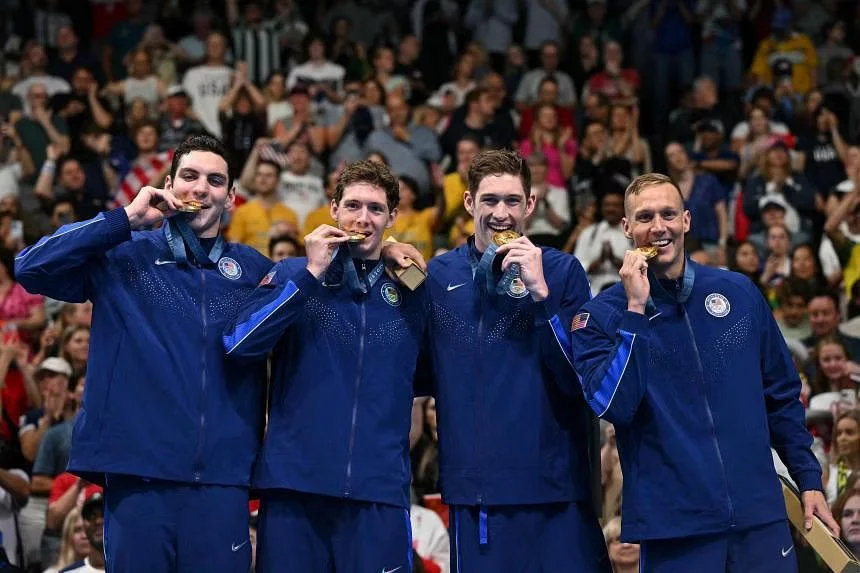 USA soar to second successive 4x100 metres freestyle title as Dressel bags more gold