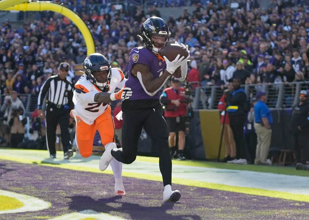 NFL roundup: Ravens soar over Broncos, Lions hit NFC best 7-1 record