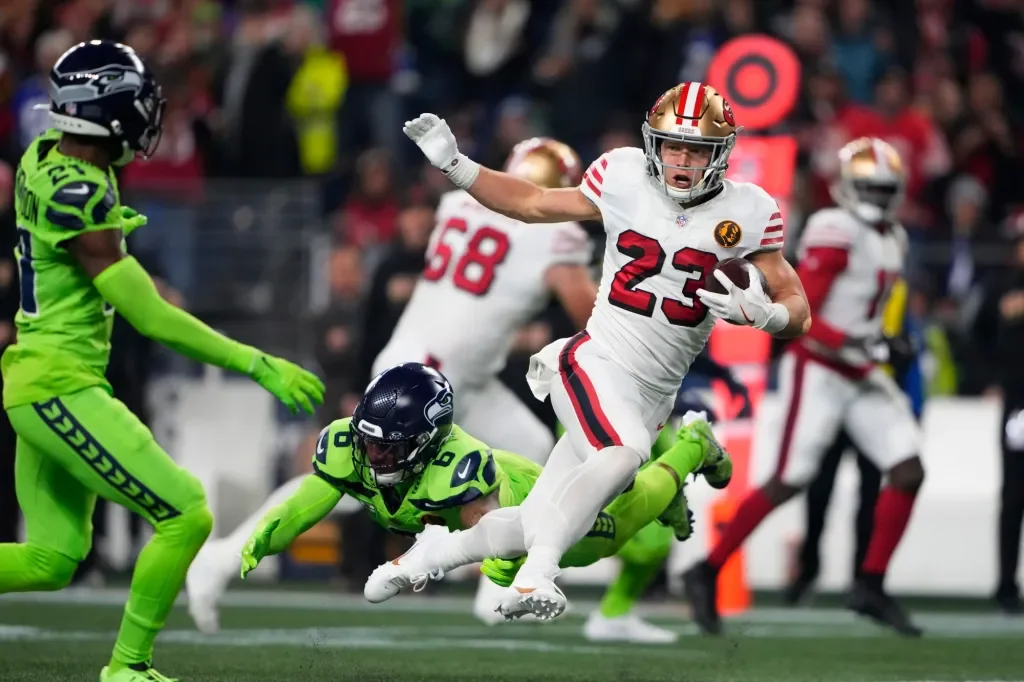 McCaffrey, 49ers roll past Seahawks on Thanksgiving night