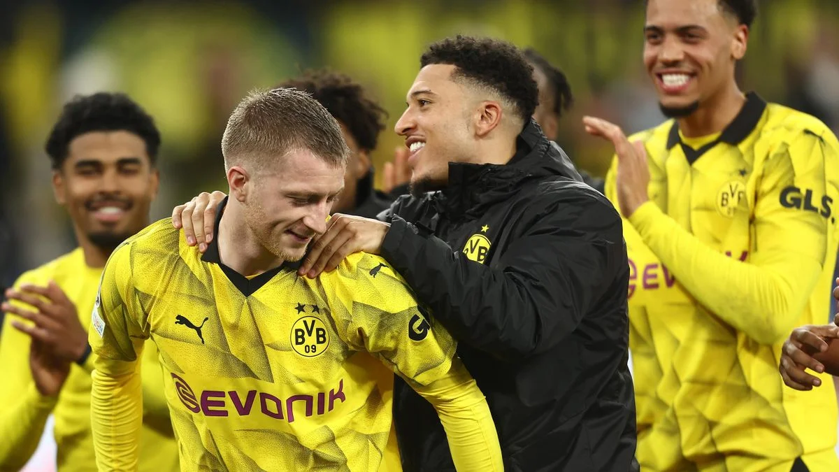 Sancho and Reus send Borussia Dortmund into Champions League quarters