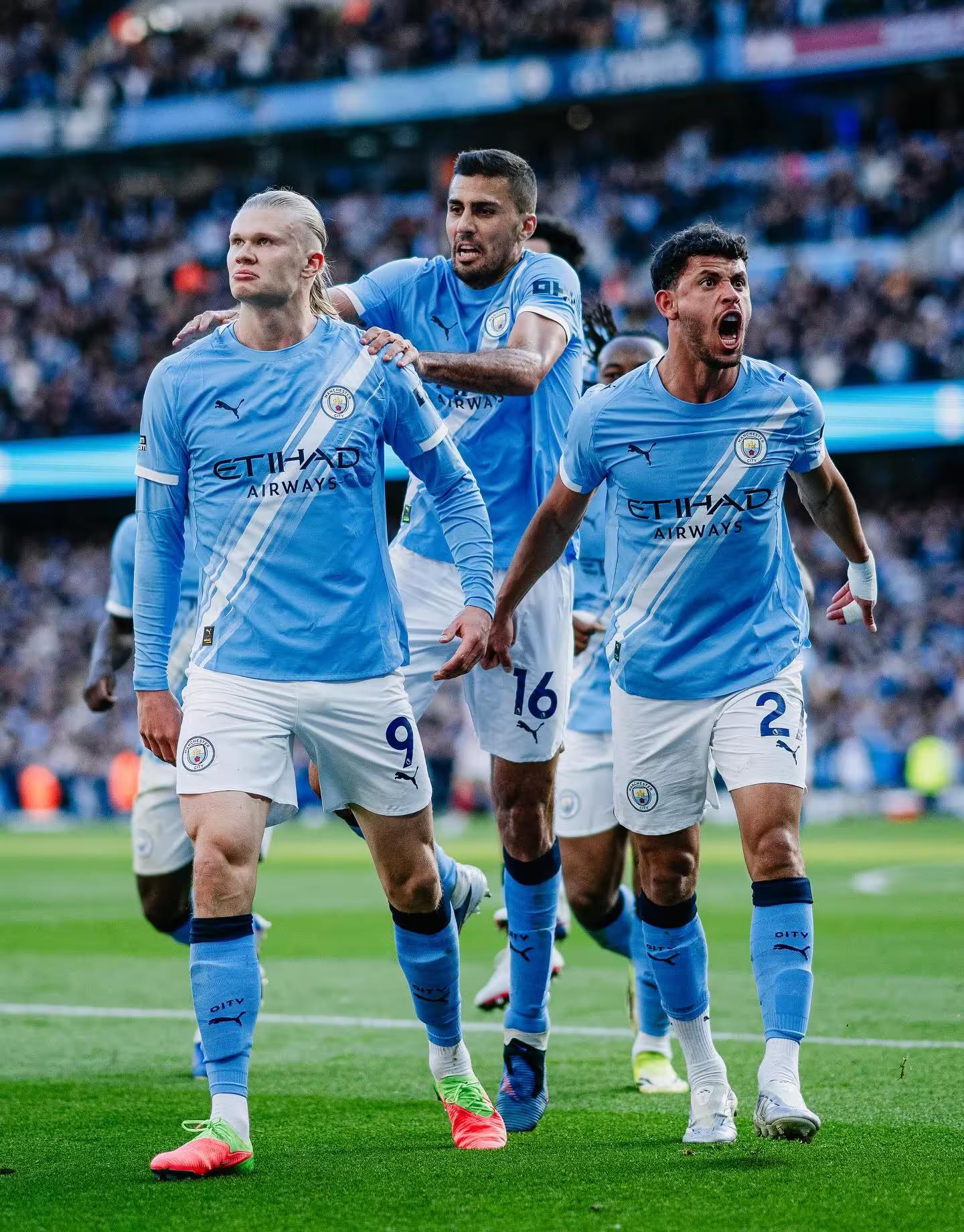 Man City 2-1 Arsenal: Haaland strike cuts title gap to three points