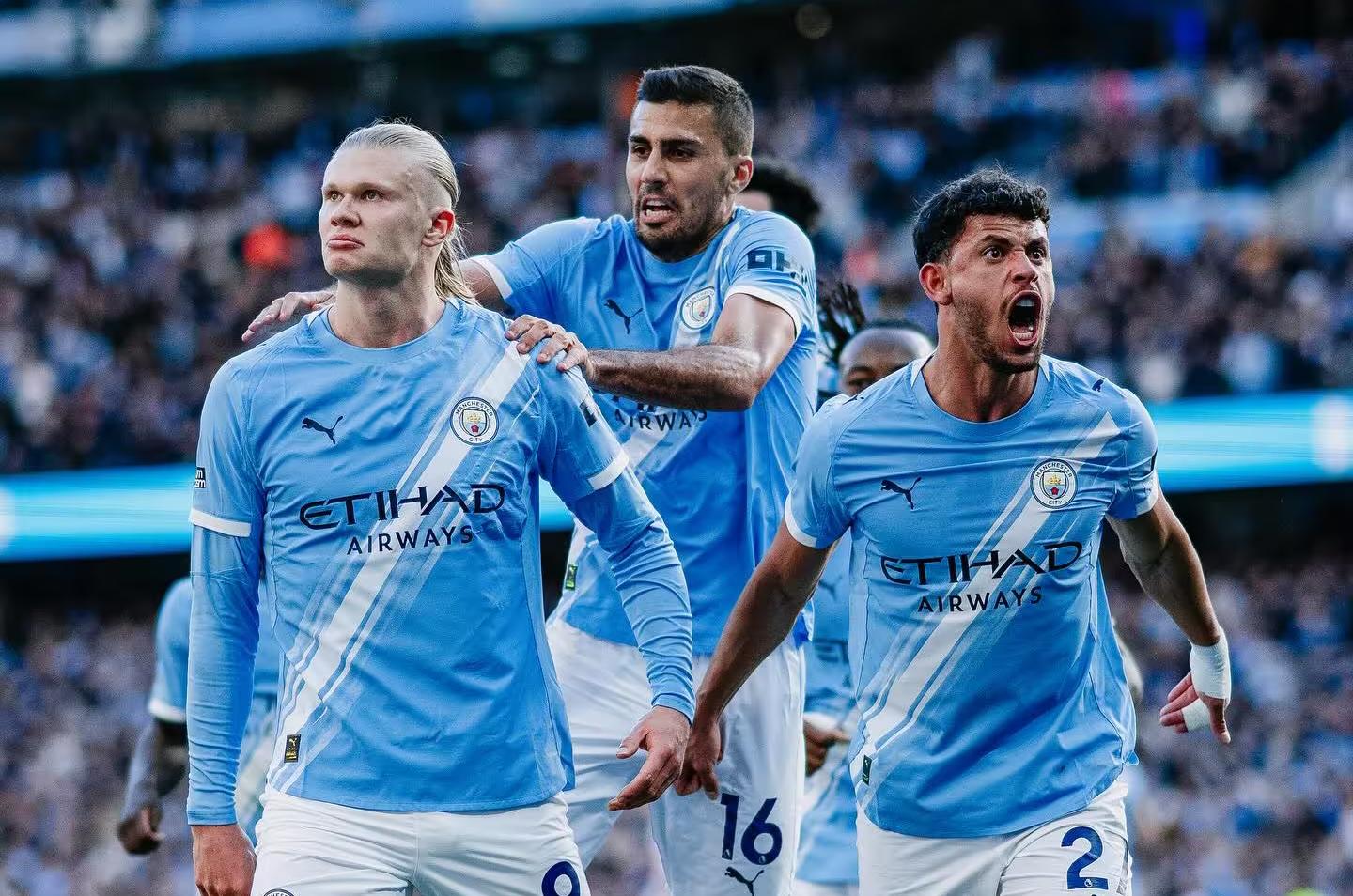 Man City 2-1 Arsenal: Haaland strike cuts title gap to three points