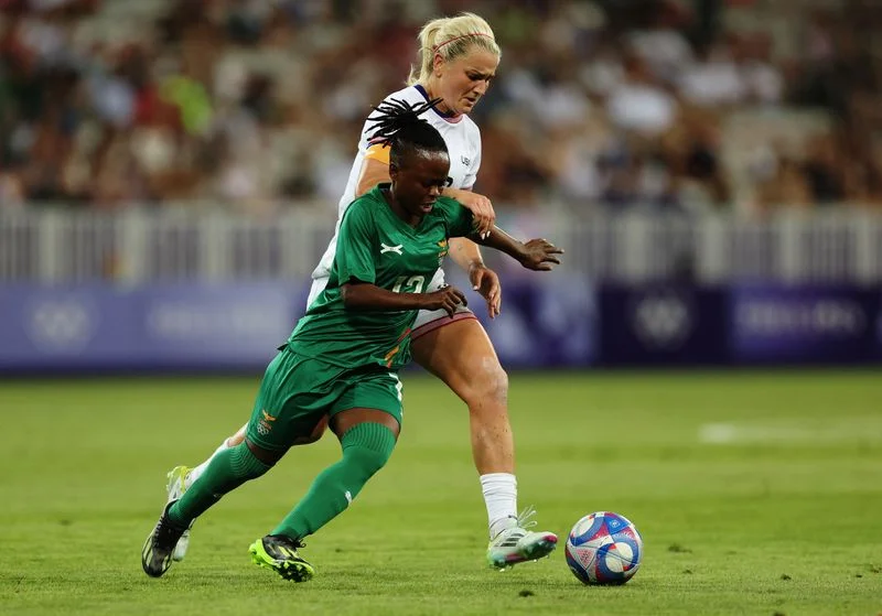Lloyd hails Swanson's record-breaking double in opening USA win over Zambia