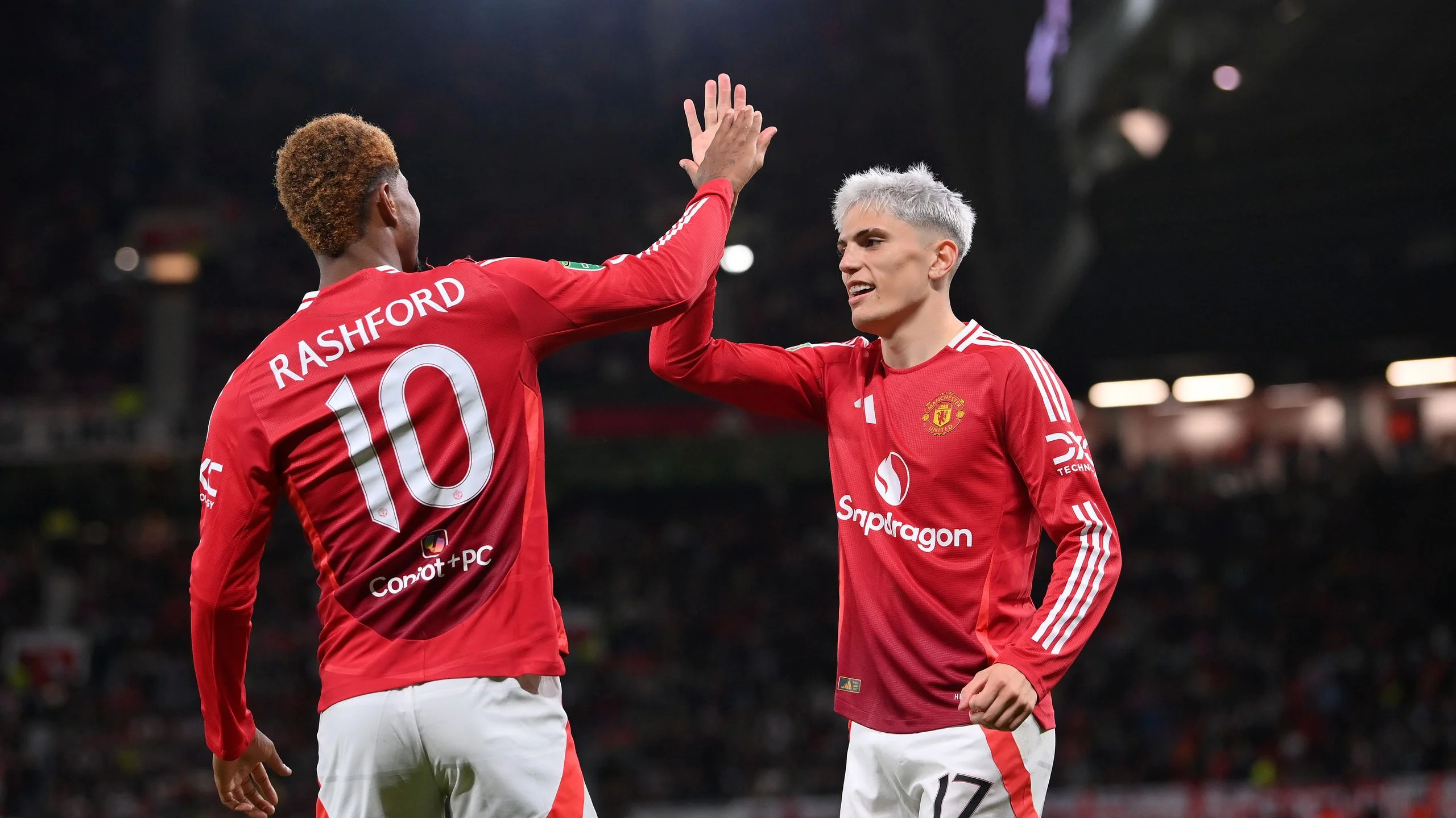 Manchester United put seven goals past Barnsley to progress in League Cup