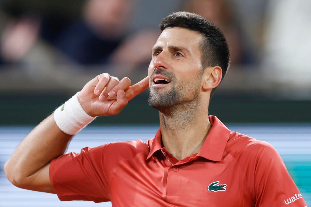 Djokovic hangs on to defeat Musetti in latest ever French Open finish