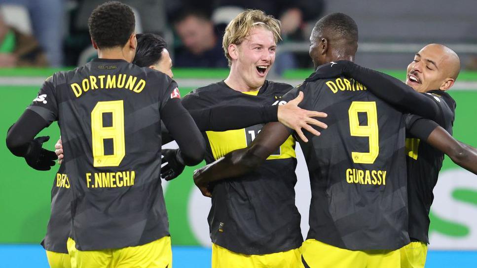 VfL Wolfsburg 1-3 Borussia Dortmund: 10-man Dortmund hold on to claim first away victory of season
