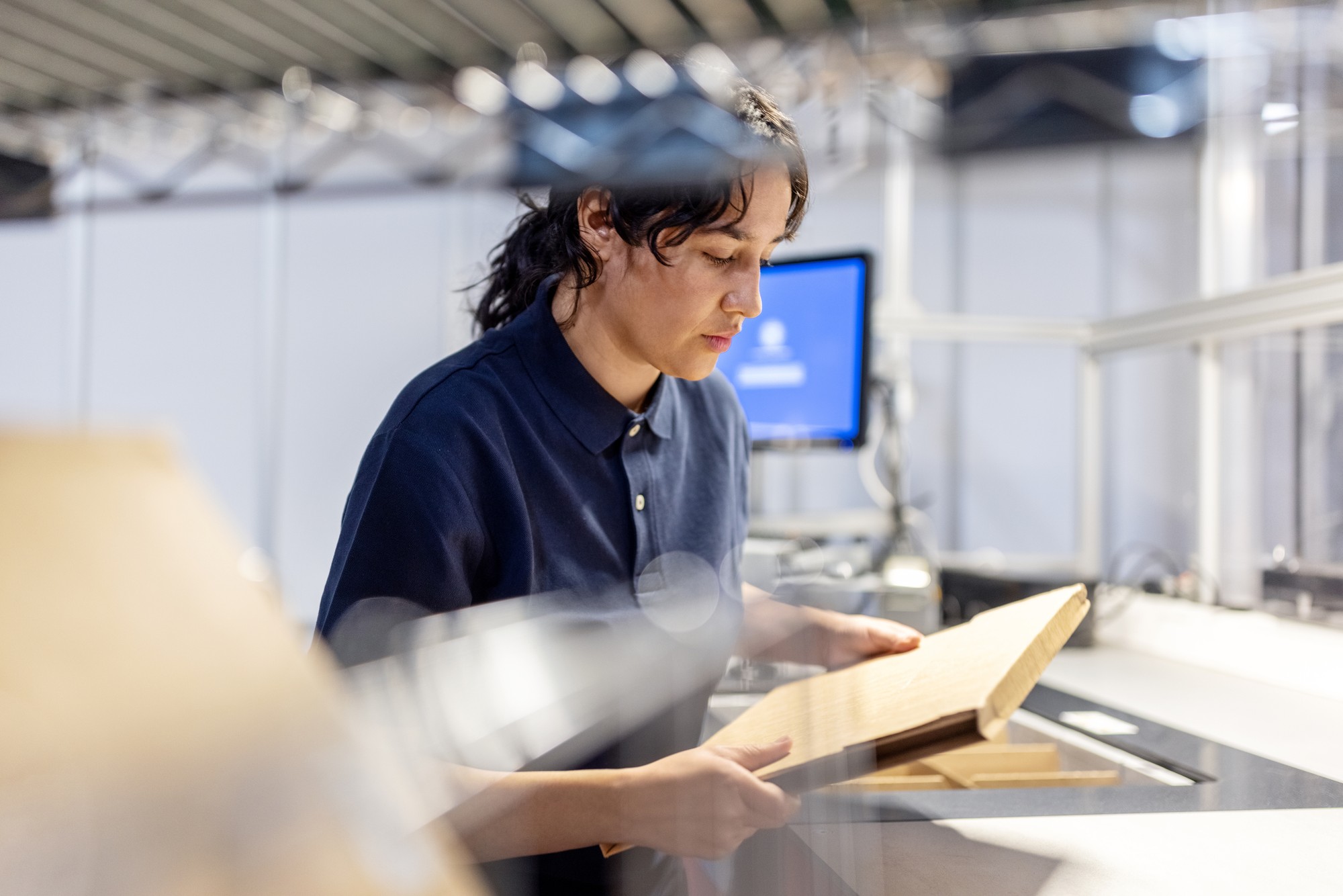Employee looking at package