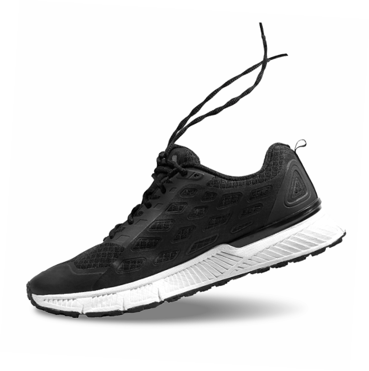 Black and white sneaker with untied laces floating in the air.