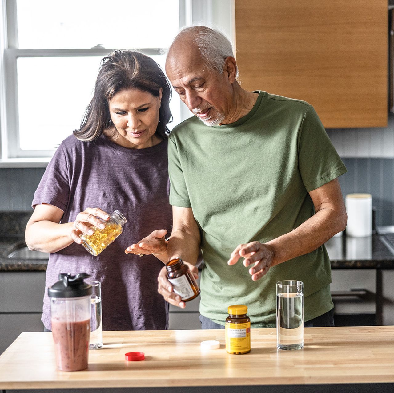 A couple looking at their nutraceutical items.