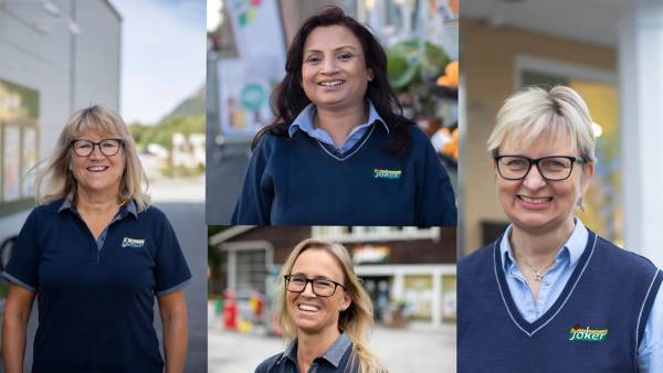 Smilende kvinnelige ledere hos Joker