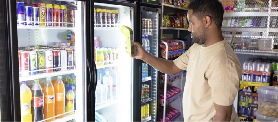 Store owner scanning products
