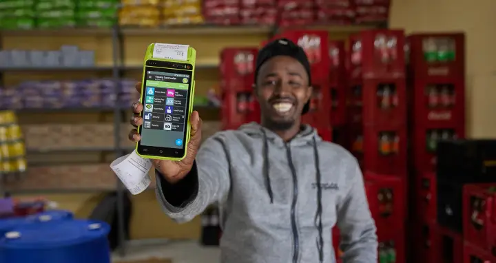 Owner holding fintech machine