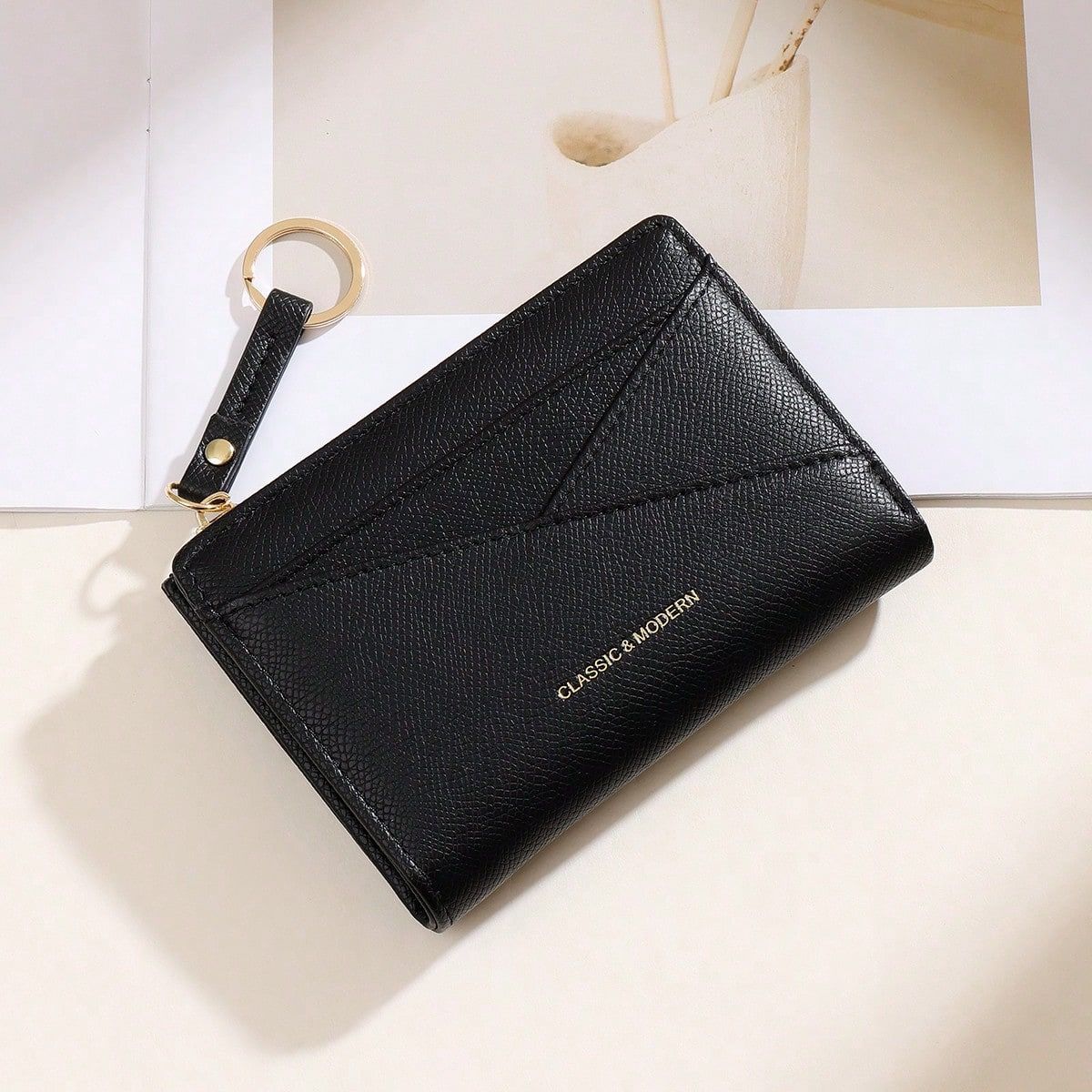 Wallet with asymmetrical design