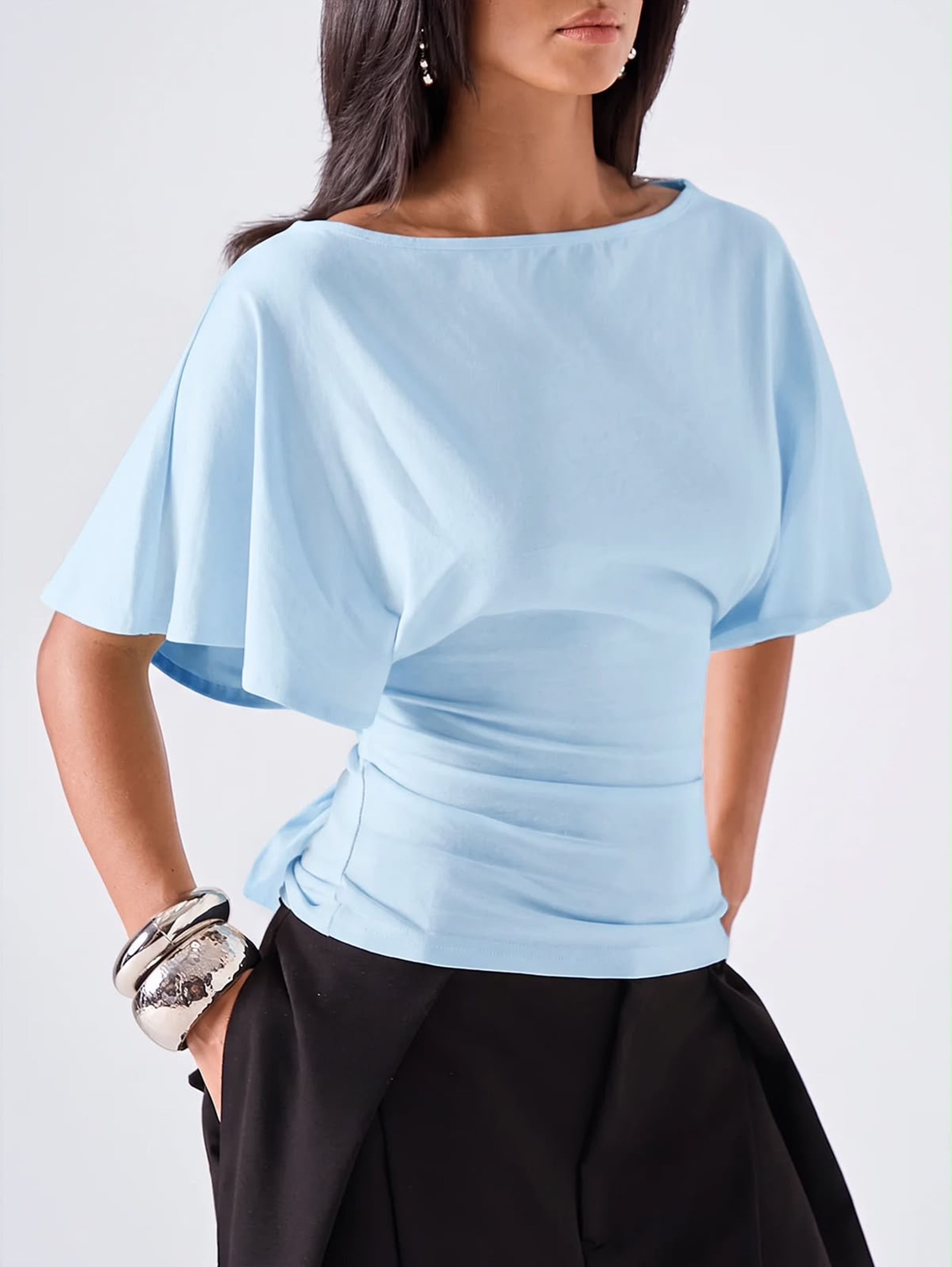 Camisa con mangas boladas y lazo atrás