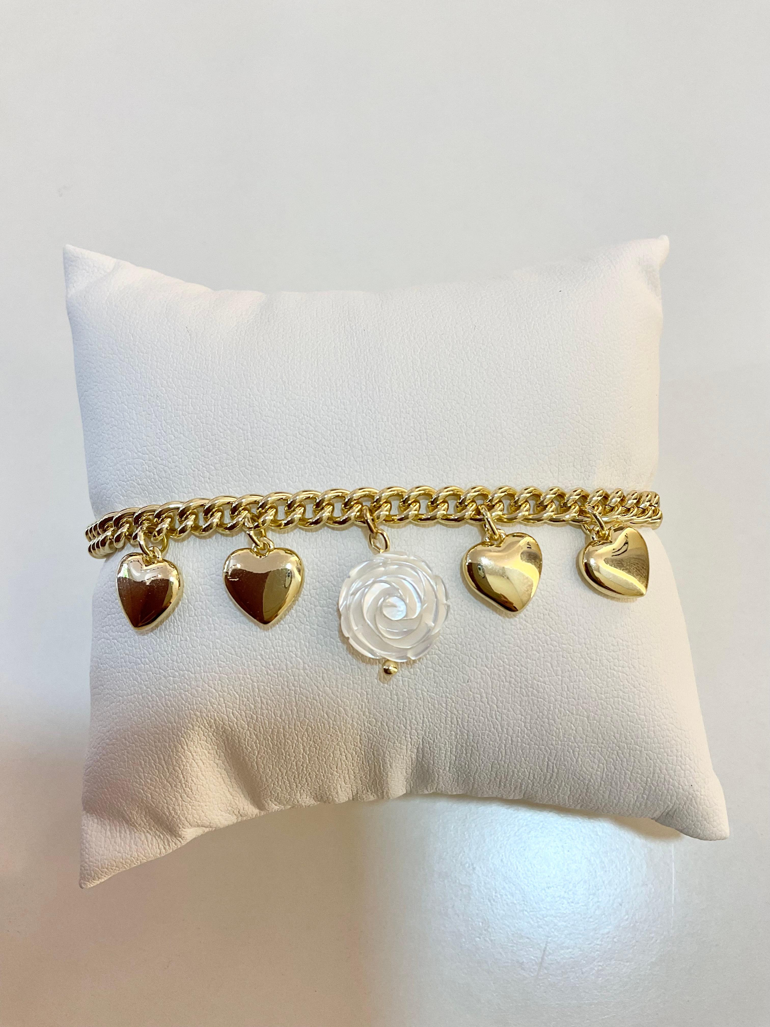 Bracelet with heart charms and white flower