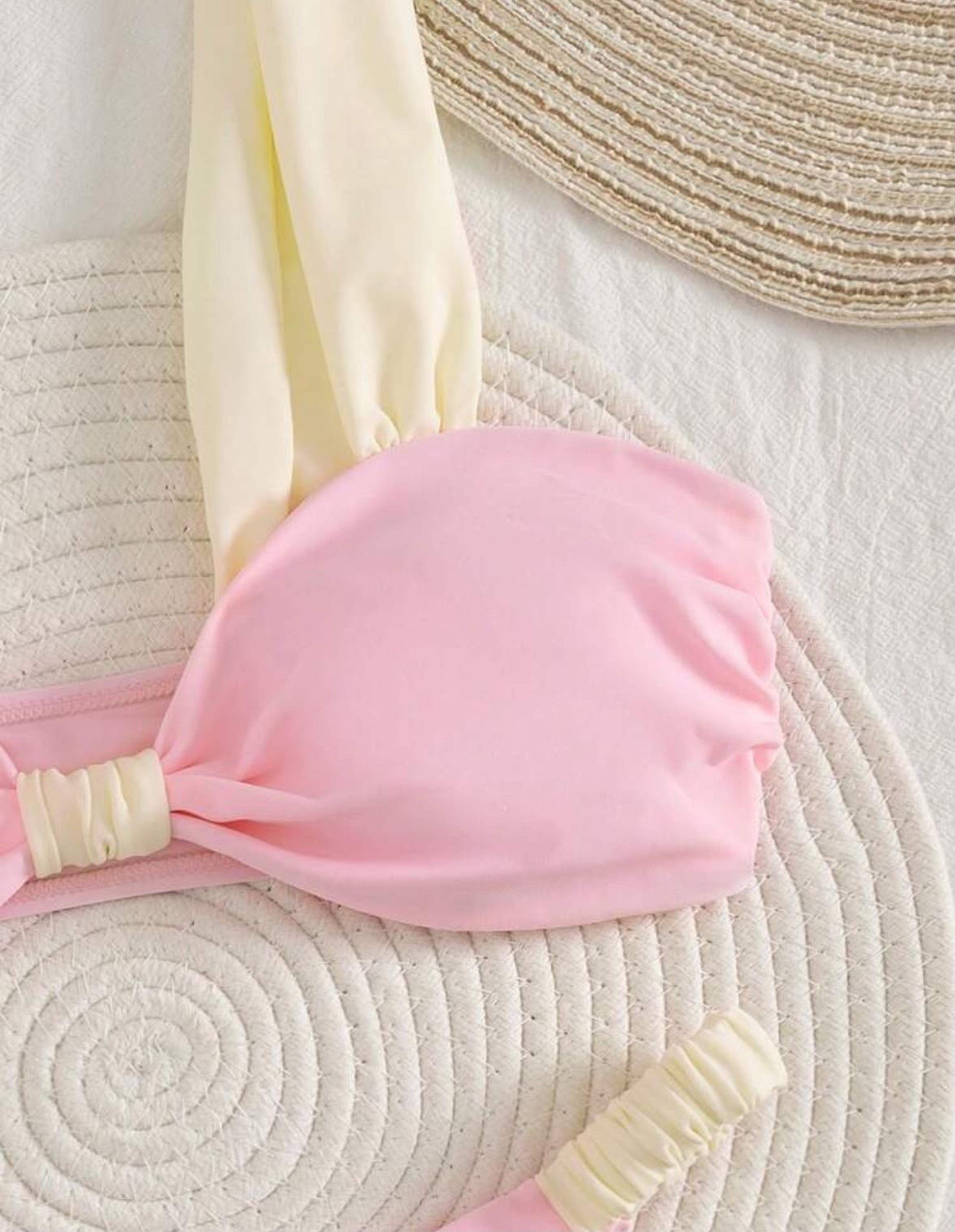 Pink two-piece swimsuit view 2